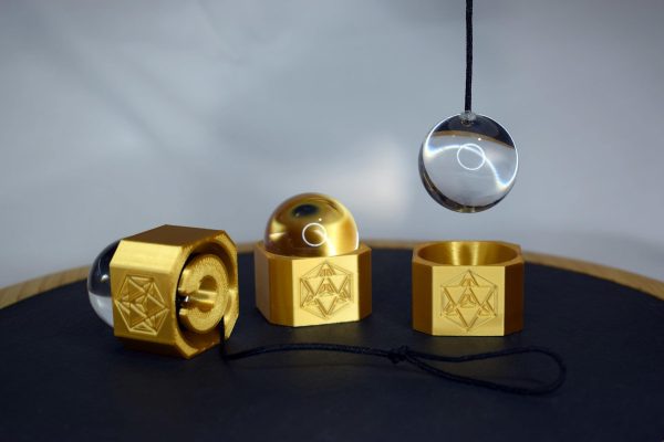 Neutral pendulum with a sacred geometry stand
